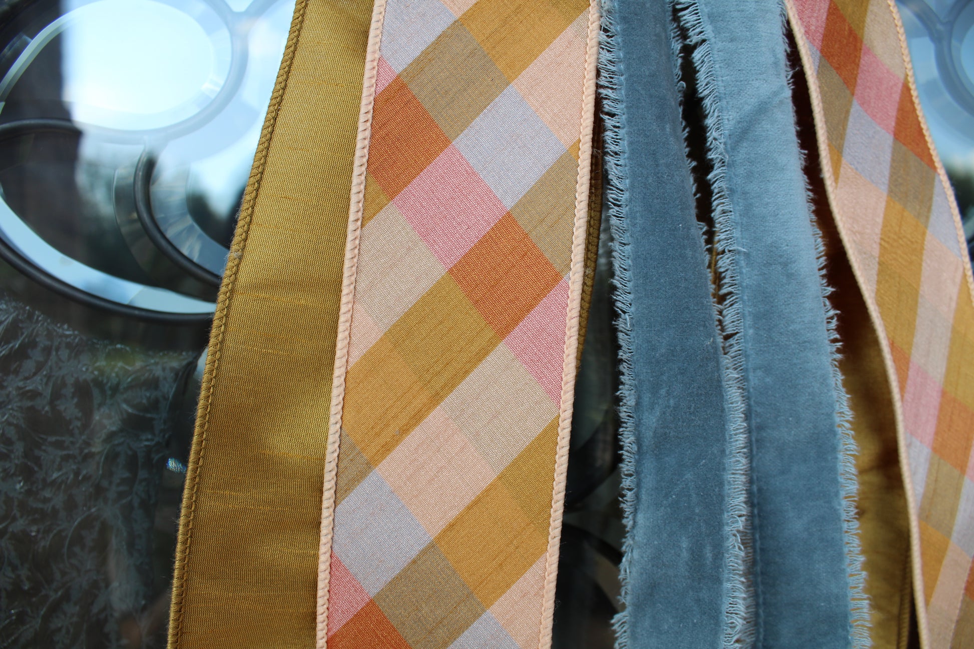 Close-up of a ribbons with checkered pattern and plain texture.